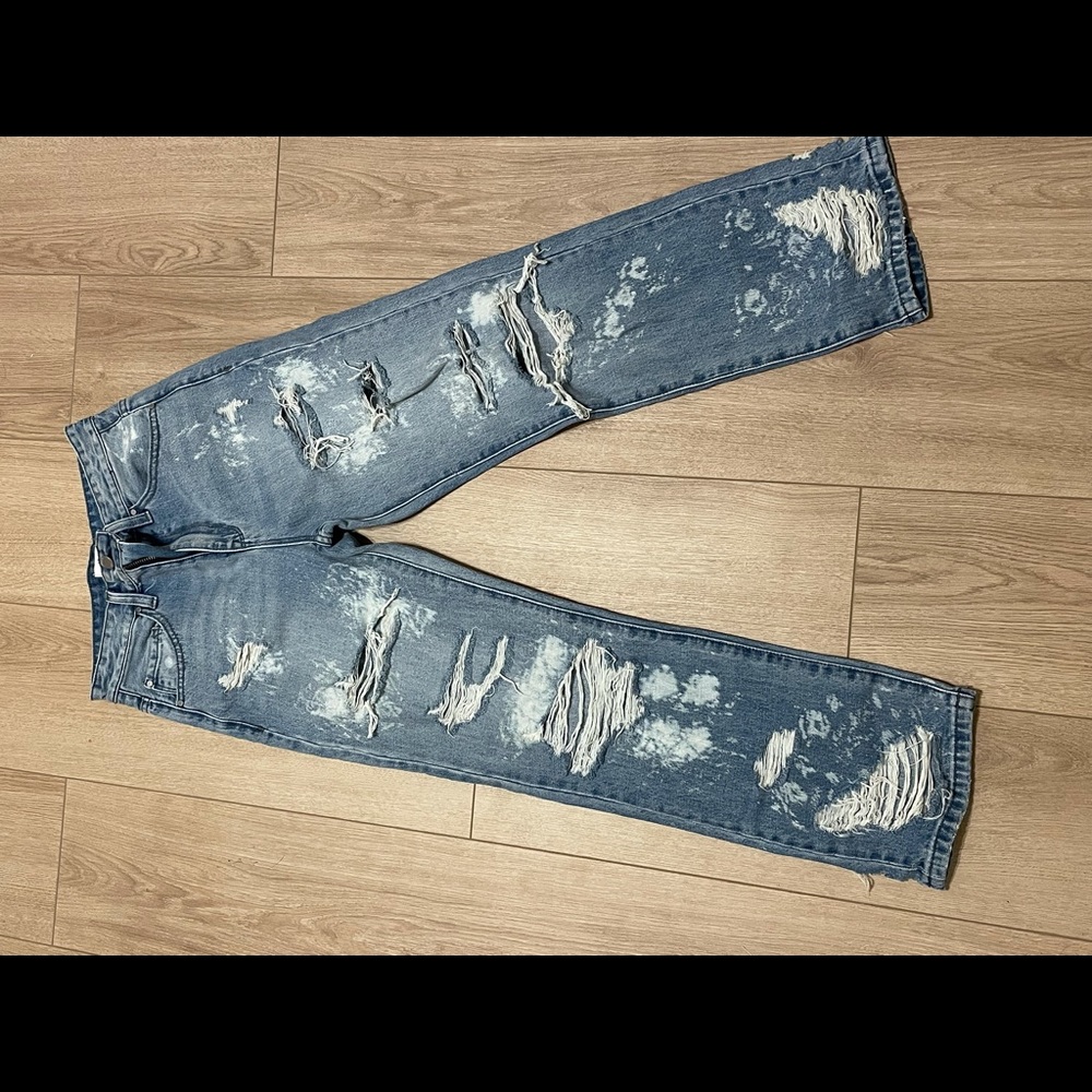Color: Denim with bleach stains
